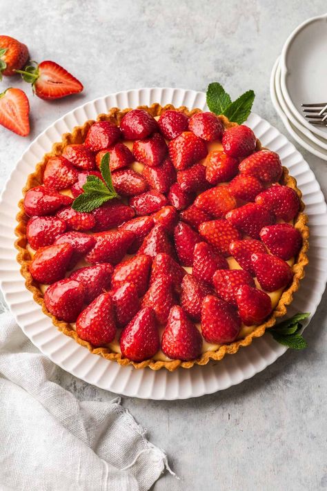 This French Strawberry Tart (Tarte aux Fraises Classique) combines a buttery sable pastry with silky smooth vanilla pastry cream custard. Topped with fresh strawberries coated in a sweet apricot glaze, this classic tart recipe is the ultimate dessert straight out of a pastry shop. Parisian Pastry, Fruit Pastry, Strawberry Cottage, Dessert Pies, Vanilla Pastry Cream, Butter Pastry, French Dessert Recipes, Rainbow Board, Fruit Tart Recipe