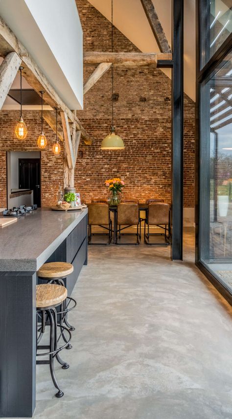 Old farmhouse converted into a warm industrial farmhouse with view of an old brick wall, and original wooden beams. Warm Industrial, Old Brick Wall, Interior Design Per La Casa, Industrial Living, Decor Shabby Chic, Industrial Interiors, Exposed Brick Walls, Brick Walls, Old Bricks