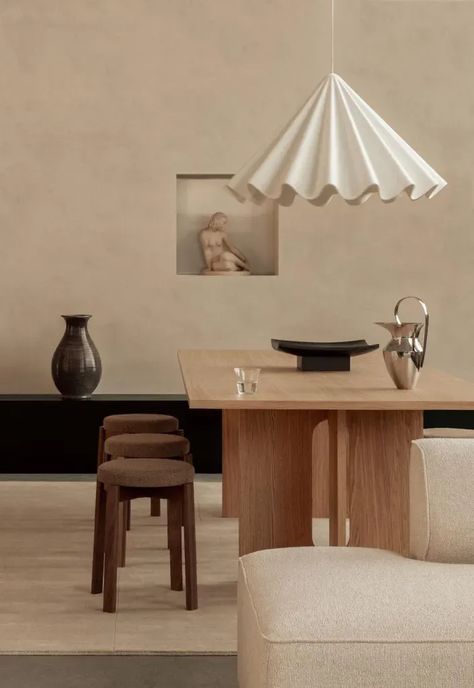 Soft minimalist dining area with oak table, cushioned Passage stool and sculptural pendant light from Audo Copenhagen | New design finds - March 2024 | These Four Walls blog Copenhagen Design Interior, Dancing Pendant, Copenhagen Furniture, Solid Oak Furniture, Audo Copenhagen, White Canopy, Upholstered Stool, Bed Bench, Stationery Storage