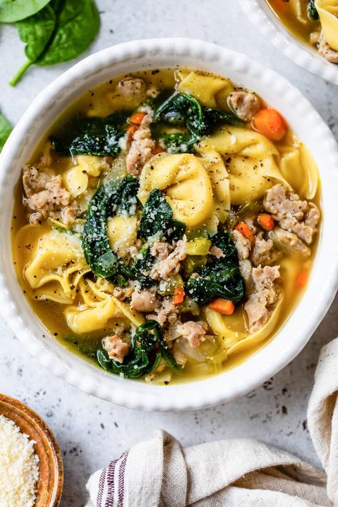 This easy Sausage Tortellini Soup is a cozy one-pot meal that comes together quickly, making it ideal for busy weeknights. It’s a complete, satisfying dinner that the whole family will love. #onepot #soup #tortellini #sausage #dinner #highprotein Spinach And Tortellini Soup, Spinach And Tortellini, Sausage Tortellini Soup, Pizza Soup, Med Diet, Sausage Tortellini, Italian Sausage Pasta, Healthy Soups, Food Motivation