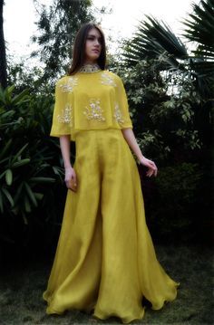 Yashodhara crop top paired with flaired palazzos Haldi Outfits, Style Guru, Salwar Kamiz, Indian Dresses Traditional, Trendy Dress Outfits, Beach Getaway, Indian Bridal Outfits, Designer Dresses Casual, Designer Party Wear Dresses