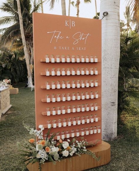 forest wedding drink station display Drink Chart For Wedding, Wedding Tequila Shots Wall, Wedding Eating Table Ideas, Diy Cricut Seating Chart, Beer Glass Seating Chart, Wedding Seating Chart Drinks, Shot Glass Wall Seating Chart, Wedding Guests Seating Chart, Alcohol Seating Chart Wedding