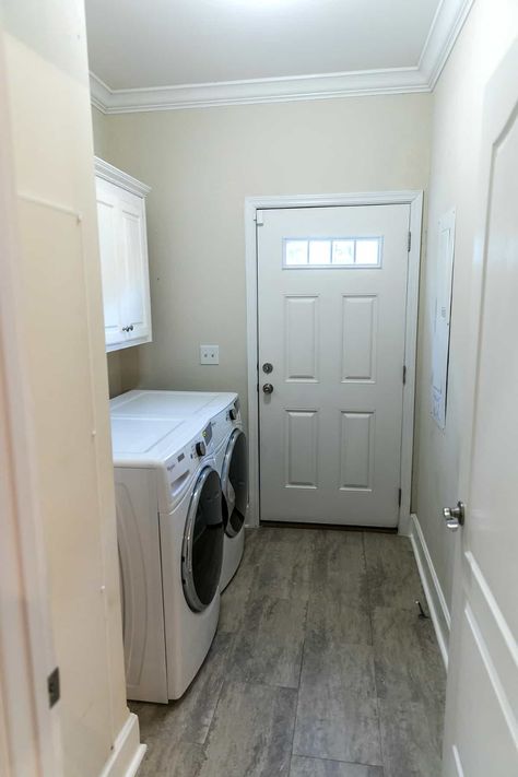 Laundry Room Entrance From Garage, Small Walk In Laundry Room Ideas, Laundry Room Galley Layout, Laundry Room Off Garage Entry, Walk Thru Laundry Room From Garage, Pass Through Laundry Room To Garage, Walkthrough Laundry Room, Walk Through Laundry Room To Garage, Narrow Laundry Room Design