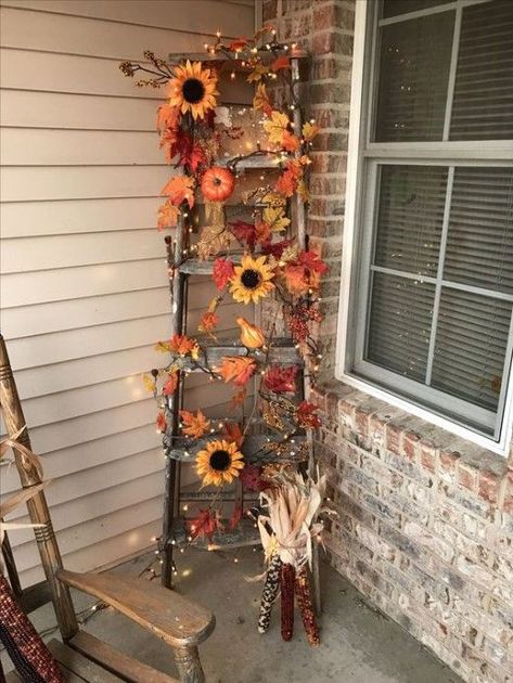 65+ Amazing Thanksgiving Porch Decorations for a Happy Fall | HubPages Wooden Ladder Fall Decor, Fall Ladder Decor Ideas Outdoor, Outdoor Fall Ladder Decor, Fall Porch Ladder Decor, Fall Ladders Ideas, Decorating A Ladder For Fall, Ladder Halloween Decor, Outdoor Seasonal Decor, Fall Decor Ladder