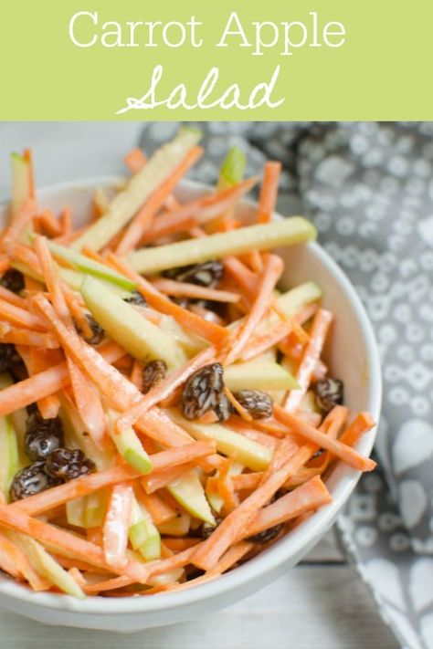 Carrot Apple Salad - sliced carrots and apples with raisins in a sweet and tangy dressing! So easy and so delicious! My kids love this! Carrot Apple Salad, Raisin Salad, Salad Apple, Carrot Raisin Salad, Sliced Carrots, Salad Kale, Carrot Salad Recipes, Carrot Slaw, Apple Salad Recipes