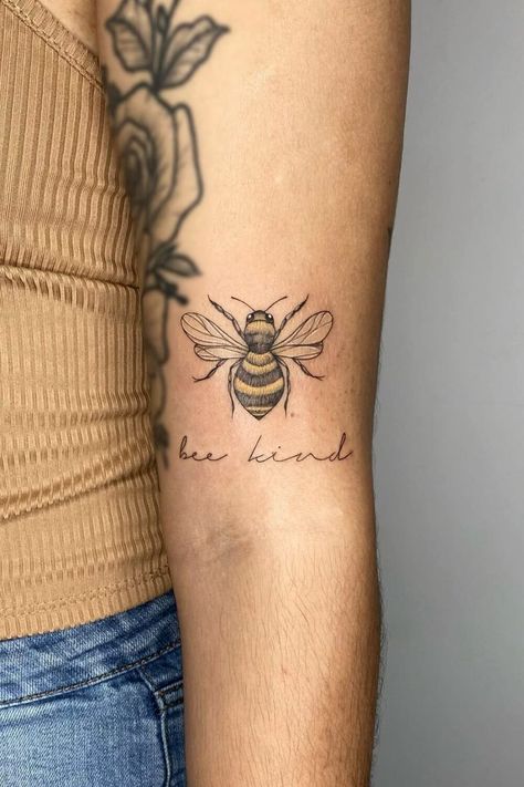 bee tattoo with a quote Back Of Arm Bee Tattoo, Bee Tattoo Ideas Cute, Masculine Bee Tattoo, Just Bee Tattoo, Bee Still Tattoo, Pretty Bee Tattoo, Bee Yourself Tattoo, Ladies Shoulder Tattoo Ideas, Feminine Bee Tattoo