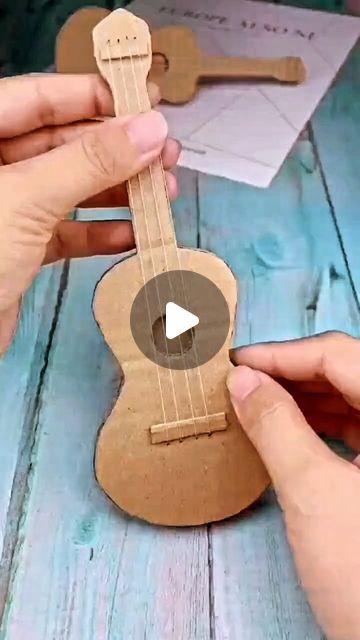 Making A Guitar Out Of Cardboard, Cardboard Guitar Diy, Guitar Crafts For Kids, Musical Instruments Craft, Things To Make With Cardboard, Musical Crafts, Recycling Activities For Kids, Guitar Craft, Cardboard Guitar