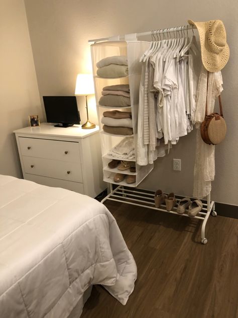 Clothing Rack Storage Ideas, Apartment Clothes Organization, Studio With No Closet, Clothing Rack In Small Bedroom, Clothing Rack Storage, Hanger Rack Bedroom, Bedroom Ideas With Clothes Rack, Exposed Clothes Rack, Closet Area In Bedroom