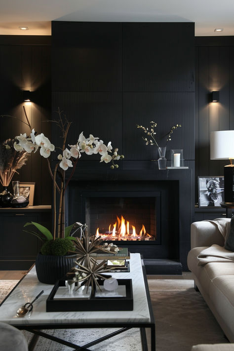 Fireplace with a black accent wall, surrounded by chic decor and cozy seating in a living room Black Fireplace Accent Wall, Black Quartz Fireplace, Black Fireplace Wall, Dramatic Fireplace, Stylish Fireplace, Black Accent Wall, Fireplace Modern Design, Fireplace Accent Walls, Fireplace Bedroom