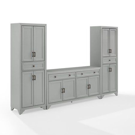 KF33012GY Tara 3 Pieces Sideboard And Pantry Set- Sideboard & 2 Pantries manufacturer by Crosley. Tara 3 Pieces Sideboard and Pantry Set Distressed Gray - Sideboard & 2 Pantries Whether you love a traditional look or a modern farmhouse vibe, the Tara 3 pieces Sideboard and Pantry Set brings stylish organization to your dining room. The sideboard features two wide full-extension drawers and two large cabinets with adjustable shelves, perfect for storing dishes and flatware. Each pantry has a full Modern Farmhouse Sideboard, Storing Dishes, Large Cabinets, Farmhouse Sideboard Buffet, Wood Entertainment Center, Farmhouse Sideboard, Sideboard Grey, Modern Farmhouse Design, Large Cabinet