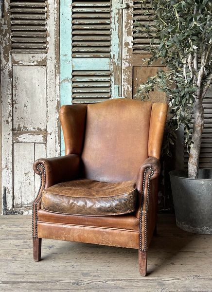 Beautiful Vintage Dutch Leather Wingback Chair | Vinterior Worn Leather Chair, Rustic Leather Chair, Leather Wing Back Chair, Leather Wingback Chair Living Rooms, Wingback Chair Living Room, Lounge Makeover, Vintage Wingback Chair, Vintage Leather Chairs, Leather Chair Living Room