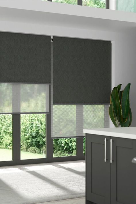 A kitchen interior showing double roller blinds over the windows. The front roller is a charcoal blockout blind and the rear layer is a light filtering sheer. Bay Window Shades, Arizona Interior Design, Roller Blinds Kitchen, Roller Blinds Living Room, Bay Window Decor, Blinds For Windows Living Rooms, Window Roller Blinds, Sheer Roller Blinds, Office Blinds