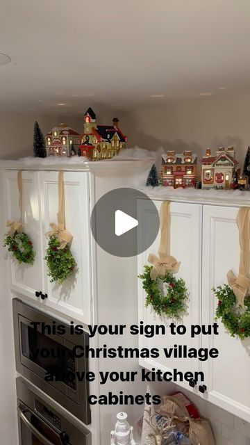 Christmas Village Over Kitchen Cabinets, Christmas Village On Top Of Kitchen Cabinets, Above Kitchen Sink Christmas Decor, Christmas Village Above Kitchen Cabinets, Christmas Decorations Above Cabinets, Christmas Village On Top Of Cabinets, Over Cabinet Christmas Decor, Present Cabinets Christmas, Above Kitchen Cabinet Christmas Decor