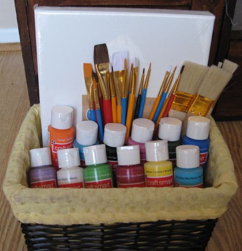 cute kid gift idea - an art gift basket with canvas, brushes and paints http://www.giftideascorner.com/gifts-for-artists Art Gift Basket, Silent Auction Basket, Family Gift Baskets, Silent Auction Baskets, Auction Basket, Christmas Gift Baskets Diy, Auction Baskets, Raffle Basket, Raffle Baskets