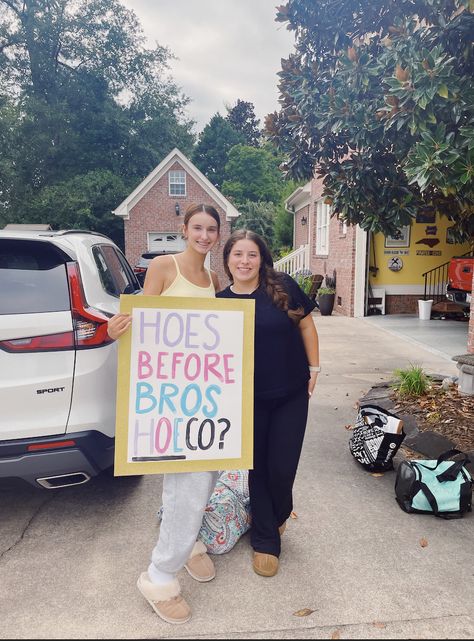 Two girls with homecoming/hoco sign. Hoes before bros hoeco? Promposals Friends, Pig Hoco Proposal, Homecoming Sign For Friend, Spotify Hoco Proposal Poster, Lumineers Hoco Sign, Prom Sign Ideas Friends, Friends Promposal Ideas, I’ve Gyatt To Go To Hoco With You, Prom Poster Ideas For Best Friends