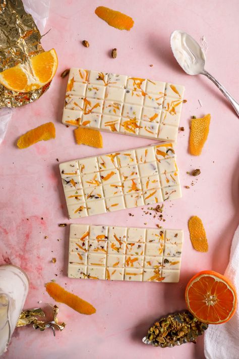 These white orange chocolate bars with pistachios are just what you need if you have extra orange peels. They’re easy to make, and the best part is that they’re gluten-free! I love how this recipe… The post How to Make Homemade Orange White Chocolate Bars appeared first on The Glutenless Maximus. Chocolate Bark Ideas, Seashell Chocolates, Charcuterie Business, White Chocolate Bars, White Chocolate Syrup, Chocolate Bar Recipe, Halloween Candies, Dreamy Desserts, White Chocolate Bark