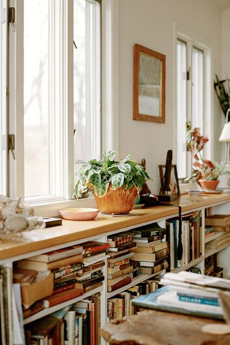 10 Things That Look Better Cluttered via @PureWow Books And Plants, Low Bookshelves, Lots Of Books, Maine Living, Home Libraries, Home Library, On The Shelf, Design Case, House Inspiration