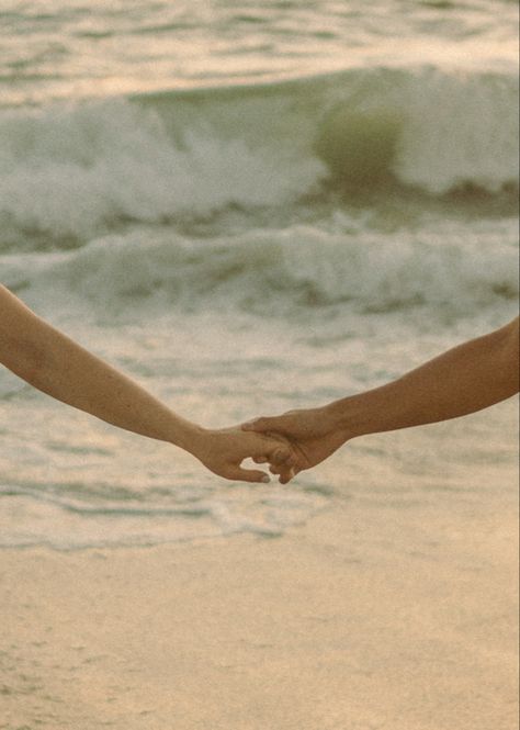 Couple holding hands at the beach #warmandfuzzy #couplesphotoshoot #engagement Perfect Life Pictures, Couple On The Beach Aesthetic, Cute Couple Beach Photos, Love Beach Aesthetic, Aesthetic Hand Holding, My Love Aesthetic, Couple In Beach, Connection Aesthetic, Hand Holding Couple