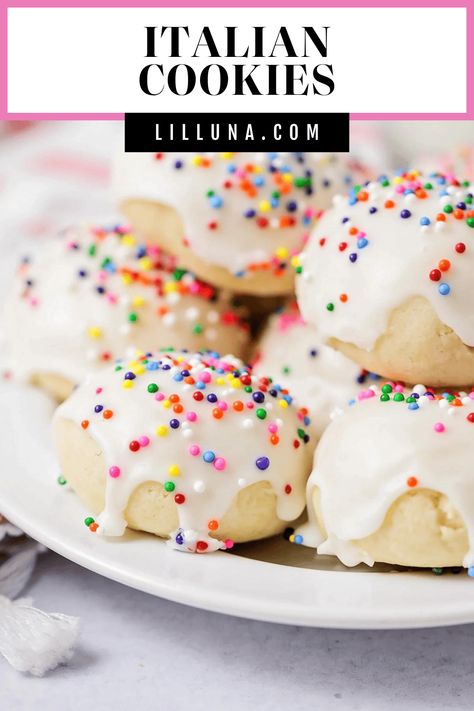 Soft Italian Cookies are dipped in a creamy glaze, topped with colorful sprinkles. They are perfect for holidays and special occasions!!. #italiancookies #italian #cookies #glazedcookies #holidaycookies Italian Cookies Recipes, Traditional Italian Cookies, Italian Christmas Cookie Recipes, Almond Glaze, Italian Wedding Cookies, Cookie Glaze, Italian Cookie, Almond Meal Cookies, Xmas Desserts