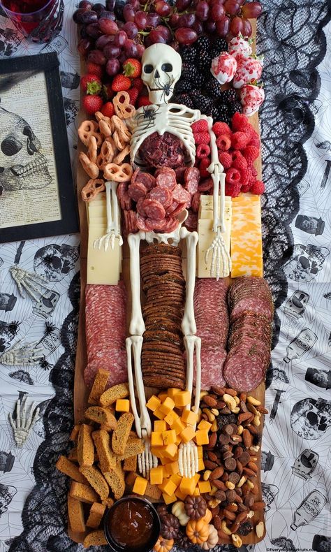 Skeleton Charcuterie Board - Everyday Shortcuts Meat Skeleton Halloween, Halloween Shareables, Filling Charcuterie Board Ideas, Aldi Halloween Charcuterie Board, Halloween Charcuterie Board For Adults, Skeleton Charcuterie Board Ideas, Skeleton Cheeseboard, Hand Charcuterie Board, Day Of The Dead Charcuterie Board