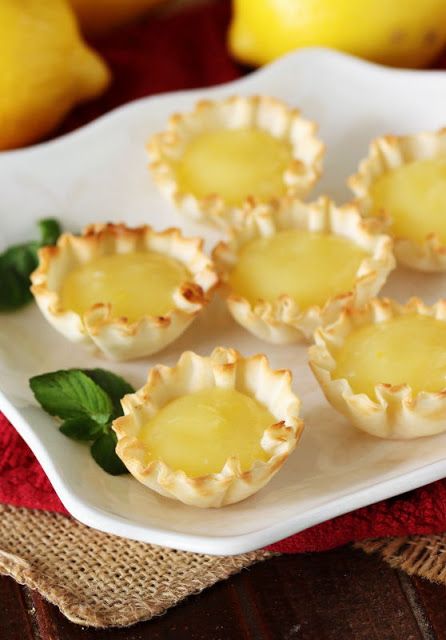 Homemade Lemon Curd in Phyllo Dough Tart Shells Image Minimal Recipes, Lemon Punch, Lemon Curd Tartlets, Curd Tarts, Almond Tarts, Philo Dough, Hostess Ideas, Phyllo Recipes, Lemon Curd Tart