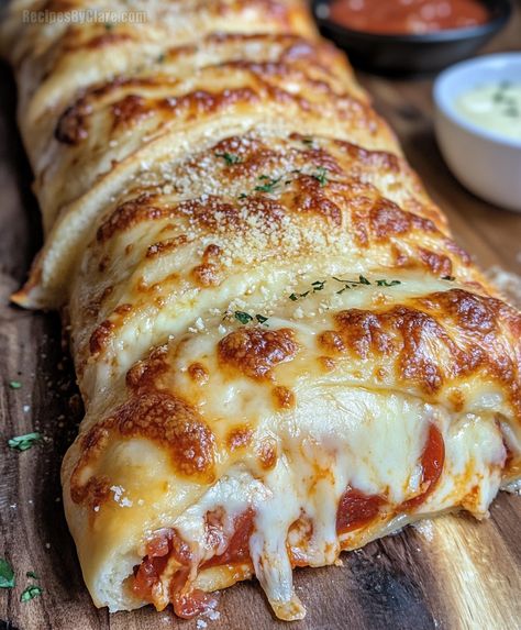 Tremendous Cheesy Pepperoni Stromboli - Delicious and Easy Recipe - Recipes By Clare Pizza Crust Stromboli Pillsbury, Uses For Pizza Crust, Cheesy Pepperoni Stromboli, Pepperoni And Cheese Stromboli, Pillsbury Pizza Crust Recipes Stromboli, Pizza Recipes With Crescent Rolls, Best Stromboli Recipe, Stromboli Video Recipe, Pizza Calzone Recipe Easy