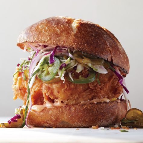 Fried Chicken Sandwich with Slaw and Spicy Mayo Recipe | Epicurious Warm Sandwiches, Spicy Mayo Recipe, Braised Chicken Breast, Crispy Chicken Burgers, Chicken Sandwich Recipe, Chicken Salad Sandwich Recipe, Slaw Recipe, Recipe For Chicken, Chicken Sandwich Recipes