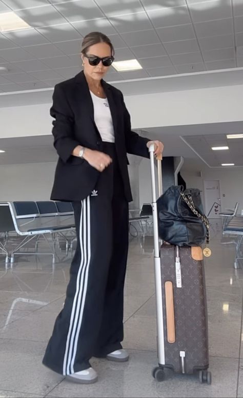 Sport Travel Outfit, Blazer And Tracksuit Outfit, Edgy Sporty Outfits Chic, Track Pants And Blazer Outfit, Wide Leg Side Stripe Trousers Outfit, Sporty Corporate Outfit, Street Casual Outfits For Women, Track Pants Winter Outfit, Travel Chic Outfit