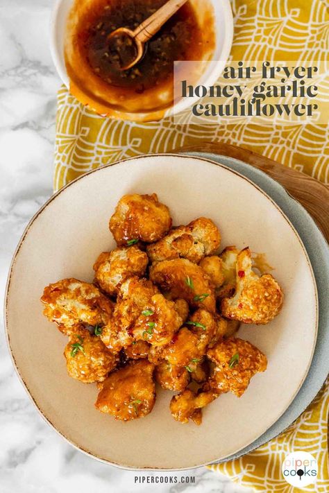 Craving something crunchy and delicious? This air fryer honey garlic cauliflower recipe is the answer. Crispy, flavorful cauliflower that's a breeze to make in the air fryer. Tossed in a sweet and savory honey garlic sauce, this dish is a veggie lover's dream. Perfect as a side or snack on game day, and quick enough for weeknight dinners, it's sure to be a hit with the whole family. Honey Garlic Cauliflower, Honey Cauliflower, How To Cook Cauliflower, Garlic Cauliflower, Cauliflower Bread, Honey Garlic Sauce, Cauliflower Recipe, Airfryer Recipes, Cauliflower Bites