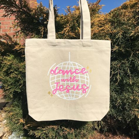 christian tote bags for summer - cute designs that help start conversations about Jesus!! 🩷🫶 get 20% off in my Etsy shop (that includes tote bags!!) through 4/29 🛒💖 click the link in my bio to shop! 🫶 •••••••••••••••• #christian #christiangirl #christianliving #christiantotebags #bible #biblejournaling #biblejournalingcommunity #christianwomen #christianwomencommunity #giftsformom #christianapparel #biblejournalinglife Tote Bag Design Ideas Paint Easy, Christian Tote Bags Diy, Bible Bag Painting, Bible Bag Ideas, Jesus Tote Bag Painting Ideas, Bible Tote Bag Diy, Christian Tote Bag Design Diy Paint, Bible Bags Totes Diy Paint, Bible Tote Bag Painting Ideas