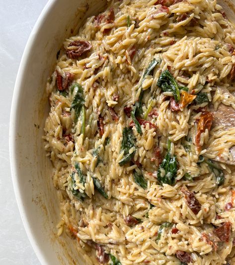 Boursin Spinach & Sun-dried Tomato Orzo Bake Spinach And Sun Dried Tomato Boursin Orzo Bake, Boursin And Sun Dried Tomato Orzo Bake, Spinach Sun Dried Tomato Orzo, Sun Dried Tomato And Spinach Orzo, Orzo And Cheese, Spinach And Sun Dried Tomato Orzo, Orzo Sun Dried Tomato Boursin, Boursin Spinach Sundried Tomato Orzo, One Pan Sun Dried Tomato And Boursin Cheese Orzo