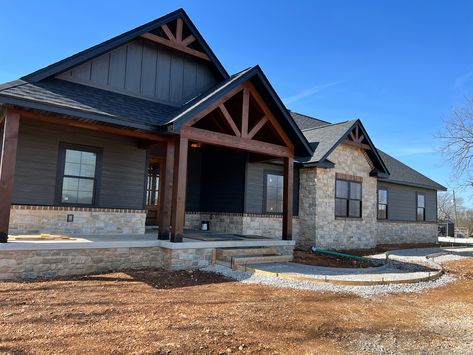 Board And Batten And Rock Exterior, Black And Gray Barndominium Exterior, Black Exterior House With Stone, Dark Vinyl Siding House, Light Gray Barndominium Exterior, Gray Barndominium Exterior, Moody House Exterior, Dark Barndominium Exterior, Black Ranch House Exterior