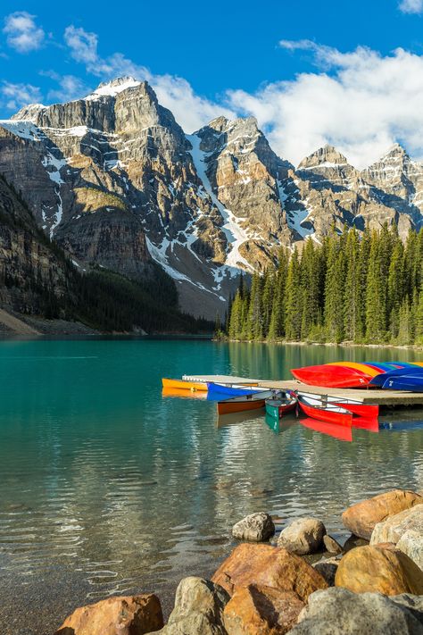 “Its waters are the most amazing colour, a vivid shade of turquoise that changes in intensity through the summer as the glaciers melt. Set in the rugged Valley of the Ten Peaks, Moraine Lake is surrounded by mountains, waterfalls, and rock piles, creating a scene so stunning it almost seems unreal. It’s an iconically jaw-dropping place that is sure to leave a lasting impression.” - Banff & Lake Louise Tourism 📸: Andy Holmes #travel #traveldestination #aesthetic #Traveltips Canada Wallpaper Iphone, Canada Wallpaper, Lake Louise Canada, Travel Itinerary Planner, Dream Dream, Moraine Lake, Puzzle For Adults, Lake Sunset, Nature Water