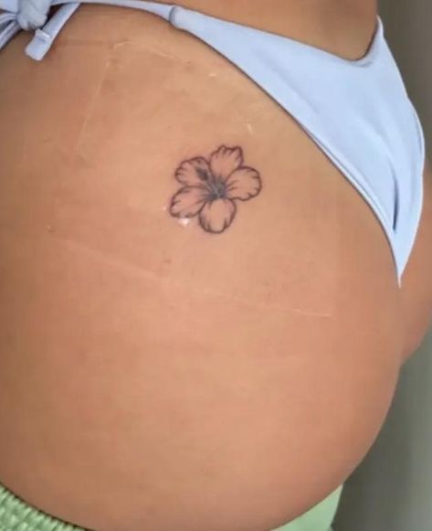 Mini Tatoos Woman, Hip To Back Tattoos Women, Cute Small Hip Tattoos For Women, Back Dimples Tattoo, Tattoos On The Buttocks For Women, Ilima Flower Tattoo, Flower Tattoos On Hip, Flower On Hip Tattoo, Small Tattoos For Buttocks