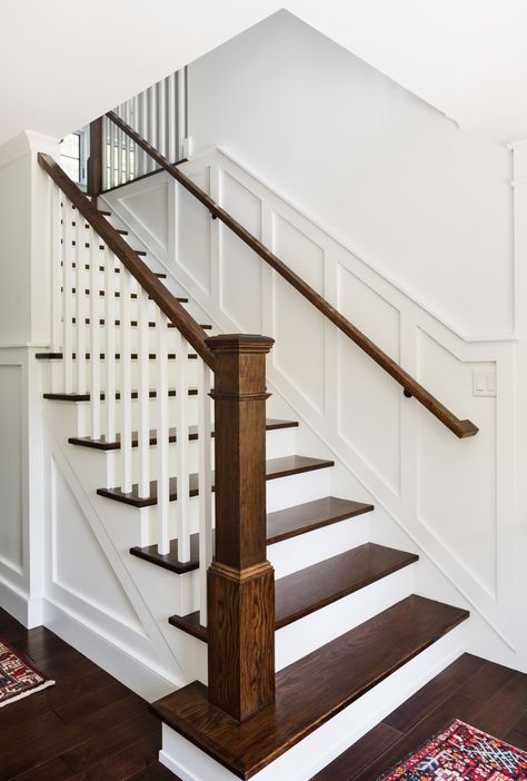 Oakwood Residence | Main Staircase | Z+ Interiors Stairs Wall Design, Classic Staircase, Farmhouse Stairs, Transitional Staircase, Stairs Wall, Interior Stair Railing, Stairs Renovation, White Staircase, Staircase Railing Design