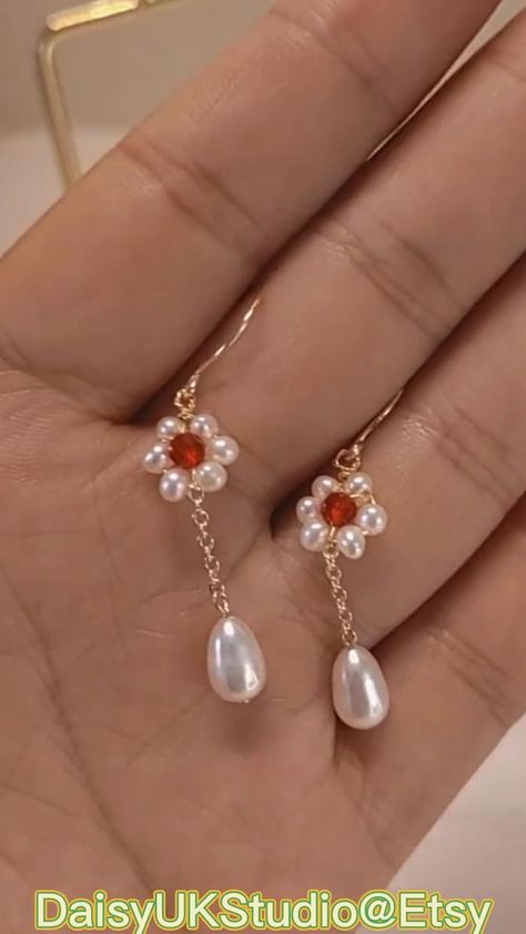 Handmade pearl earrings in 2022 | Handmade jewelry tutorials, Bridal jewelry diy, Diy jewelry videos Handmade Pearl Earrings, Diy Jewelry Videos, Anting Manik, Diy Jewelry Set, Diy Earrings Easy, Earrings Diy Handmade, Diy Wire Earrings, Diy Jewelry Earrings, Beaded Earrings Diy