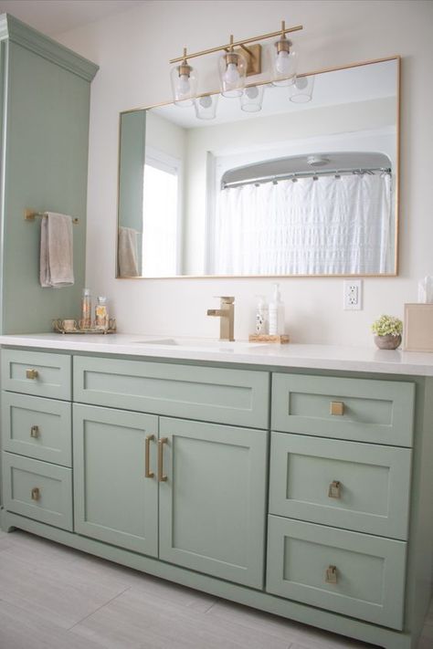 Green Bathroom Inspiration. #green #bathroom #tiles #decor #idea Mint Vanity Bathroom, Green Bathroom Vanity Brass Hardware, Mint And Gold Bathroom, Guest Bathroom Sage Green, Mint Green Bathroom Cabinets, Sea Foam Green Bathroom Vanity, Beige Painted Cabinets Bathroom, Seafoam Green Cabinets, Mint Bathroom Vanity