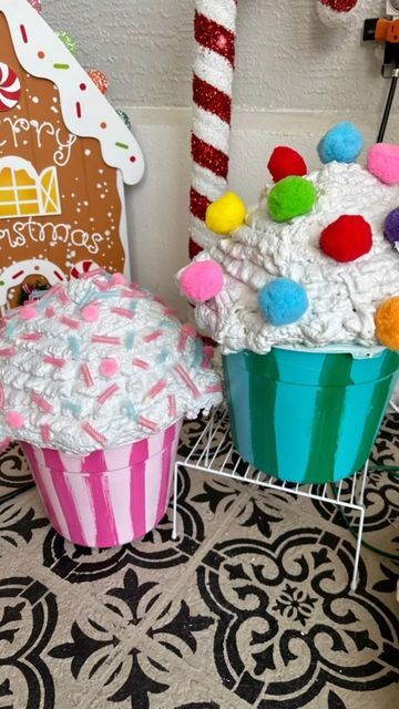 K a r e n G o v e r n a l e on Instagram: "🧁🎄 DIY Christmas delight! Created these adorable cupcake props using dollar store finds and spray foam magic! 🌟🎁 Who knew inexpensive items could turn into such cuteness? 😊✨ #DIYChristmasDecor #BudgetFriendlyCrafts #HolidayCreativity #DollarStoreDIY #candylandtheme #pinkchristmasdecor #diycupcakes #candychristmasdecor #christmasdecor #christmasmagic #candyland #candychristmas #christmas #cupcakediy #cupcakedecor #sweet #gingerbreadhouses #candylandparty #candychristmasdiy #gingerbreadhouse #candy #christmasdecorations #handmadechristmas #candyshop #pinkchristmas #gingerbreadhousedecorating #handmade #cupcakes #christmasdecorater #xmaswonderland" Diy Christmas Cupcakes Outdoor, Giant Candy Garland Diy, Cupcake Candy Decoration, How To Make Candy Props, Spray Foam Cupcakes, Candyland Christmas Ideas, Outdoor Cupcakes, Candy Land Party Food, Giant Christmas Candy Decorations