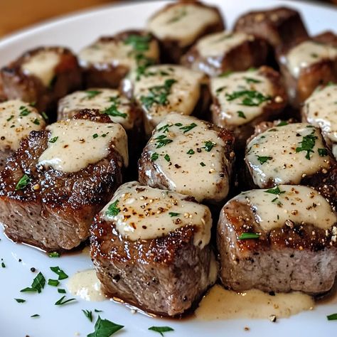 Garlic Butter Steak Bites with Parmesan Cream Sauce Recipe Steak Bites Mushrooms, Garlic Butter Steak Bites With Parmesan Cheese Sauce, Filet Mignon Steak Bites, Carnivore Steak Bites, Sauteed Steak Bites, Garlic Parm Steak Bites, Garlic Butter Steak Bites With Parmesan Cream Sauce Recipe, Garlic Parmesan Steak Bites, Garlic Butter Steak Bites With Parmesan