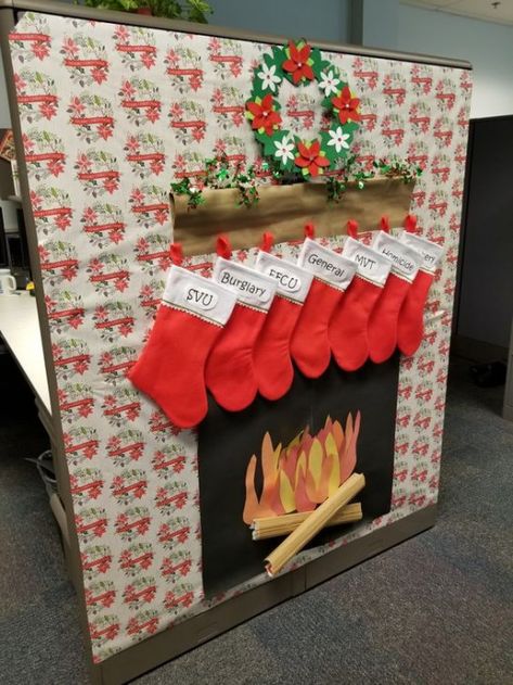 Office Decorations At Work Christmas, Holiday Cube Decorating Ideas, Seasonal Cubicle Decor, Office Christmas Cubicle Contest, Christmas Cubby Decorations, Cubical Holiday Decor Office, Cubicle Fireplace Christmas, Cubicle Holiday Decorations, Holiday Office Cubicle Decor