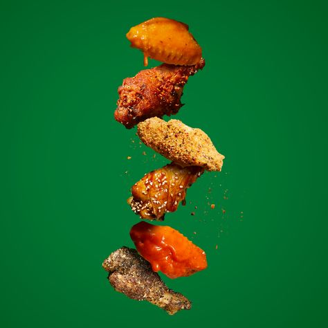 Party wings on the mind for this weekend? Check out this falling batch of savory wings by our photographer Anna Jones.  #foodphotography  #wingtime #savoryphotography #cincinnatiphotograher #omsphoto  #fouthofjuly #commericalphotographers Party Wings Recipe, Dinner Food Photography, Dinner Photography, Wings Restaurant, Local Fast Food, Food Photography Studio, Party Wings, Chicken Menu, Food Texture