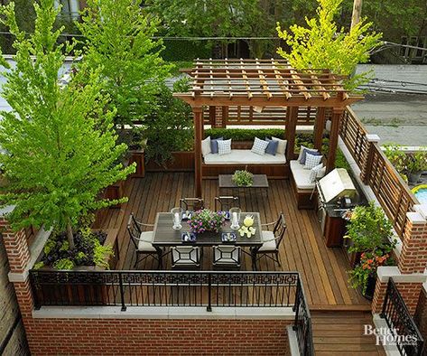 Accessible from the home's kitchen, this garage-top roof deck was designed with entertaining in mind. A dining table seats six with ease, while a built-in grill and cabinets for storing table-service items reduce trips into the house. Large trees break up views of power lines and an alley. Roof Terrace Design, Rooftop Patio Design, Urban Garden Design, Roof Garden Design, Terrace Garden Design, Outdoor Terrace, Rooftop Terrace Design, Rooftop Design, Pergola Design