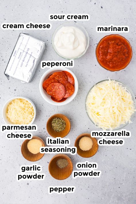 Change up your snack game with Pepperoni Dip! Cream cheese and mozzarella cheese makes it creamy and gooey, and this easy recipe makes it a breeze to prepare. Whether it's game day, a family party, movie night, or just a fun snack night, this pepperoni pizza dip will steal the show! Cream Cheese Pizza Topping, Pepperoni Dip Cream Cheese, Hot Pizza Dip With Cream Cheese, Pepperoni Dinner Ideas, Pizza Cheese Ball, Mdw Food, Pepperoni Cheese Dip, Cream Cheese Pizza Dip, Pepperoni And Cream Cheese