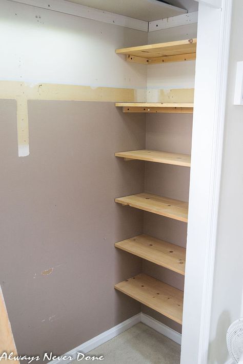 Make the most out of small closet spaces by adding shelving into 'dead spaces' on the sides of the closet space. This would be great for storing handbags. Tip use tension rods instead. Small Master Closet, Cheap Closet, Closet Small Bedroom, Front Closet, Small Closet Space, Tiny Closet, Small Closets, Closet Remodel, Small Closet Organization