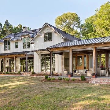 75 Beautiful Farmhouse Beige Exterior Home Pictures & Ideas - July, 2021 | Houzz House With Land, Farmhouse Exterior Design, Farmhouse Architecture, Wooden Porch, Modern Farmhouse Exterior, Exterior Ideas, House Design Photos, Farmhouse Exterior, Metal Building Homes