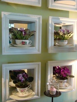 Oh now I MUST do this. I LOVE violets, and have been collecting teacups to display a few ... this makes such a beautiful display - Perfect!!! Tea Cup Display, Teacup Crafts, Bar Display, Cup Crafts, Upcycled Home Decor, African Violets, Shadow Boxes, Tea Room, Glass Jar