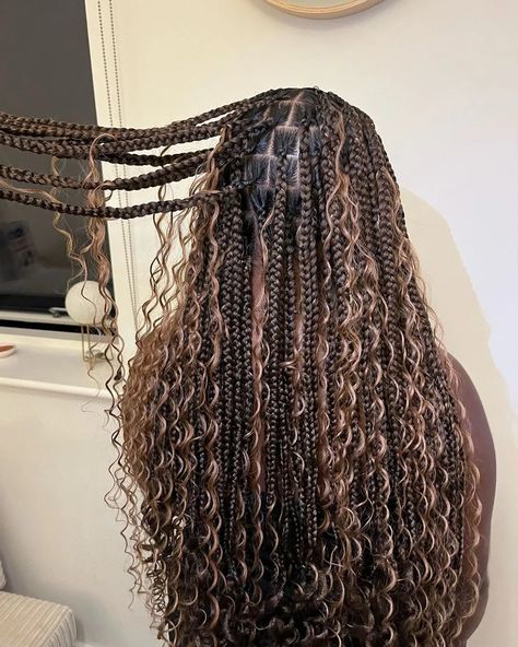 55 Goddess Braids Hairstyles Perfect for Summer 2024 | Glamour Knotless Braids With Curly Strands, Full Goddess Knotless Braids, Medium Sized Goddess Braids, Boho Knotless Braids Extra Curls, Goddess Braids White Girl, Dark Brown Boho Knotless Braids, Long Goddess Knotless Braids, Medium Box Braids With Curls, Brown Goddess Knotless Braids