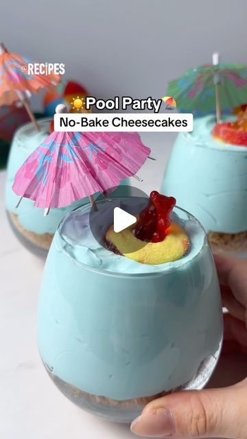 Recipes on Instagram: "Looking for the perfect summer dessert to serve to your friends and family?☀️ These Pool Party No-Bake Cheesecakes are the ultimate treat!⛱️ Comment below if you would try these!✨ #poolpartynobakecheesecakes #poolparty #nobakecheesecake #cheesecake #cheesecakecups #summerdesserts #summer #summerrecipes #grahamcrackers #cute #dessertrecipes #nobakedesserts #dessertsIngredients:
-1 sleeve of graham crackers, crushed
-1/2 stick butter, melted
-1 package of cream cheese
-1/2 cup sugar
-1 container Cool Whip
-4 drops blue food coloring
-gummy bears, peach rings, and mini umbrellas for decoration" Pool Party Dessert Ideas, Birthday Cake Pool Party, Pool Party Desserts, Week Snacks, Pool Cake, Cruise Food, Cheesecake Cups, Cruise Party, Blue Desserts