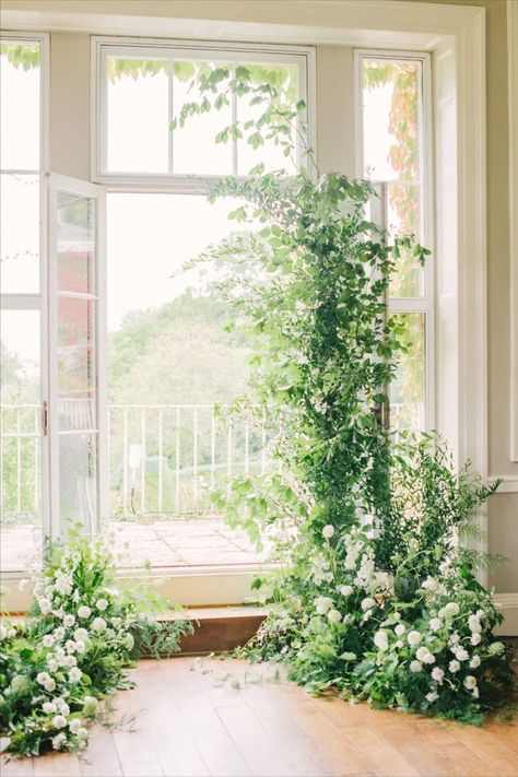 A deconstructed foliage archway with delicate white flowers created in a natural style White Floral Installation, Foliage Wedding Decor, Natural Wedding Flowers, Flowers Display, Green Wedding Decorations, Timeless Bride, White Wedding Arch, Green And White Wedding, Summer Wedding Ceremony