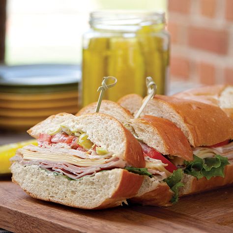 Having company for the big game? You need sandwiches for a crowd. Whether you're having a houseful of people over to cheer on your team or you're packing a portable feast for on-site tailgating, sandwiches are the best way to feed a lot of people. These 10 awesome recipes cover both hot and cold creations, and Ballgame Food, Shower Sandwiches, Tailgate Sandwiches, Sandwiches For A Crowd, Cold Sandwich Recipes, Pumpkin Crunch, Marinated Vegetables, Paula Deen Recipes, Cold Sandwiches